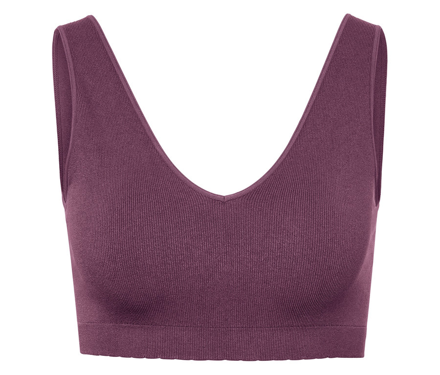 Erik renginde, V yakalı sporcu sütyeni.