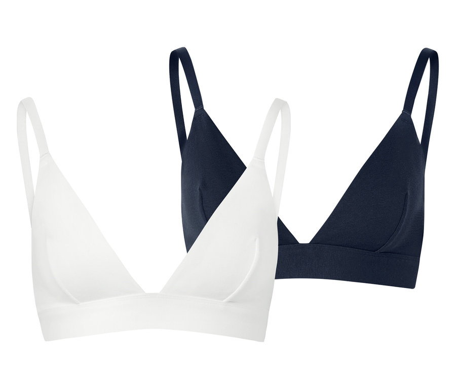 Beyaz bir arka plan üzerinde biri beyaz diğeri lacivert olmak üzere iki adet üçgen sütyen.