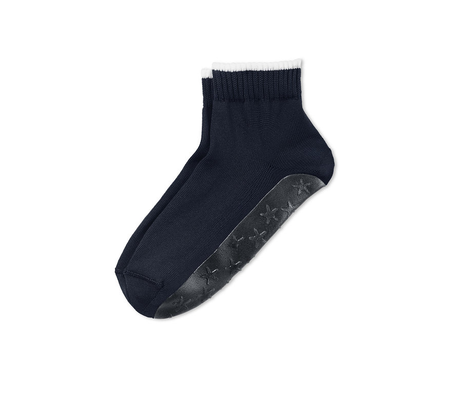 Beyaz kenarlı lacivert plaj ve spor çorabı.