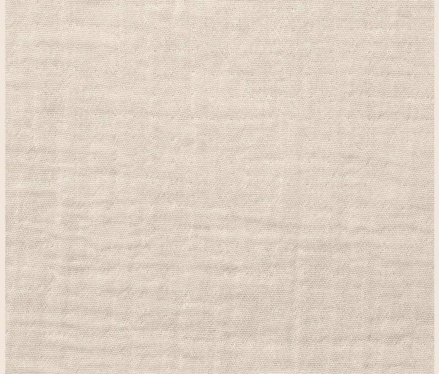 Bej rengi müslin şerit örtünün yakın çekim görüntüsü.