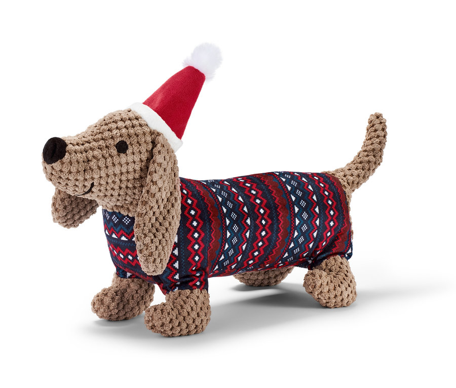Pelüş Sosis Köpek oyuncak, Noel şapkası ve kazağı giyiyor.
