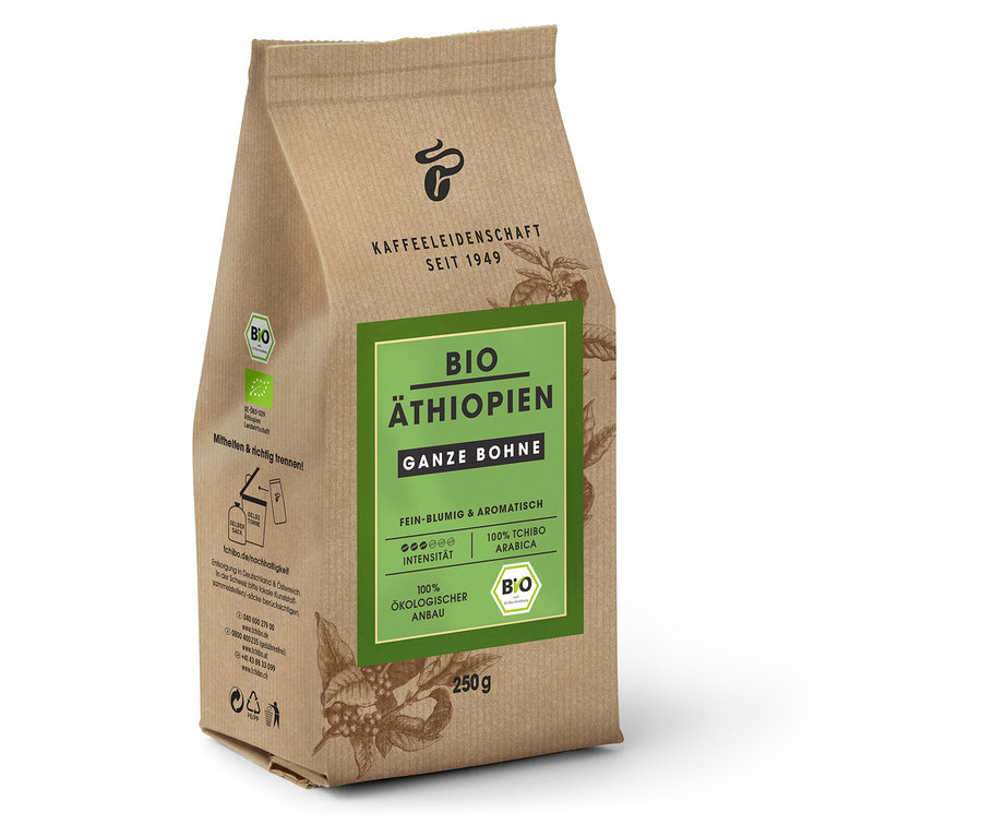 Bir paket Organik Etiyopya - 250 g Çekirdek Kahve dik duruyor. Paket kahverengi ve yeşil bir etikete sahip.