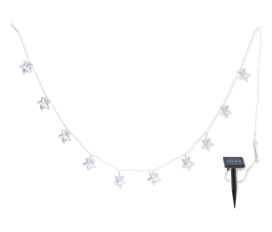 Dış mekan kullanımı için küçük bir güneş paneli ile yıldız şeklinde ışık zinciri.