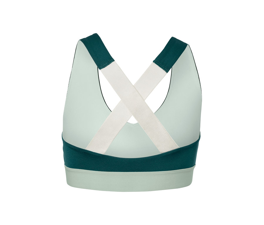 Beyaz çapraz askılı yeşil sporcu sütyeninin arka detay görünümü.