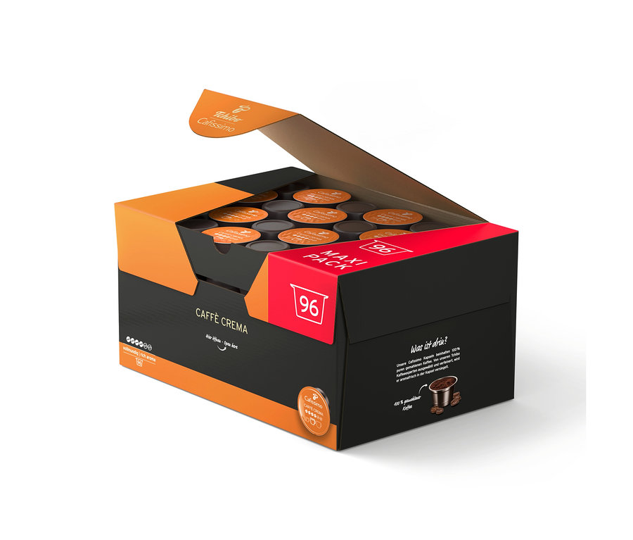 96 adet Tchibo Cafissimo Caffè Crema Rich Aroma kahve kapsülü içeren açık siyah ve turuncu kutu.