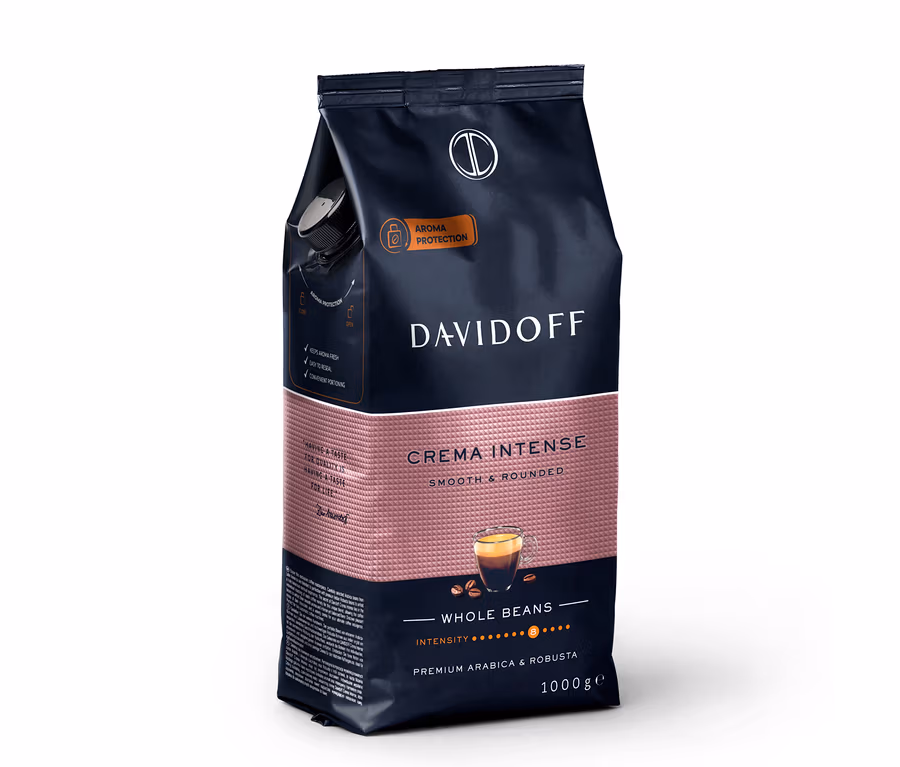 Koyu mavi üst kısmı ve dokulu gül altın rengi alt kısmı olan 1 kg'lık DAVIDOFF CAFÉ Crema Intense kahve çekirdeği paketi. Pakette "AROMA PROTECTION" yazısı ve kremalı bir kahve fincanı ile kahve çekirdekleri görseli bulunuyor.