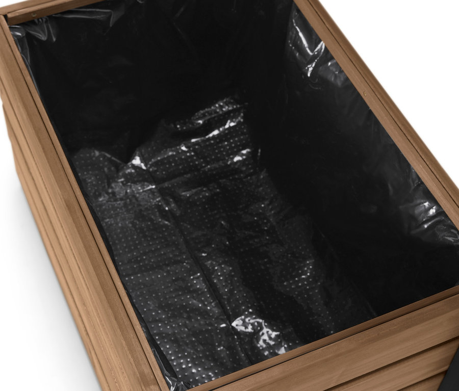 Siyah ek parçasıyla birlikte Elin bitki duvarının üst kısmının yakın çekim görüntüsü