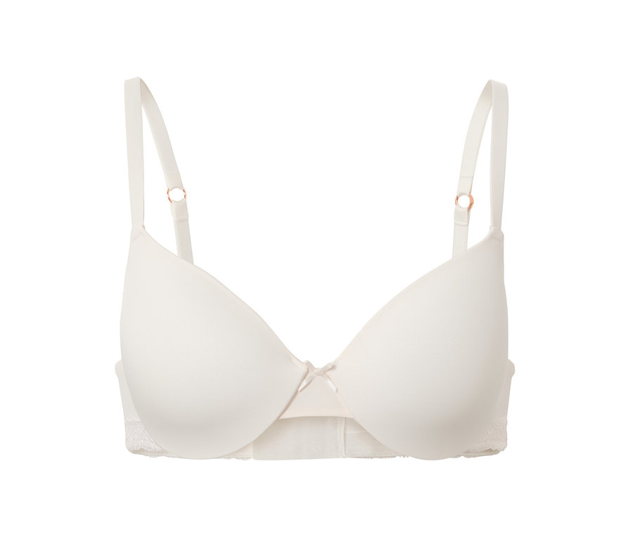 Ortasında kurdele bulunan krem rengi tişört sütyen.