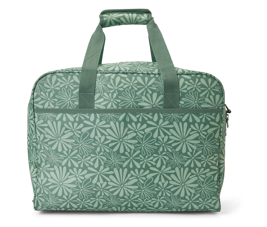 Çiçek desenli yeşil dikiş makinesi çantası.