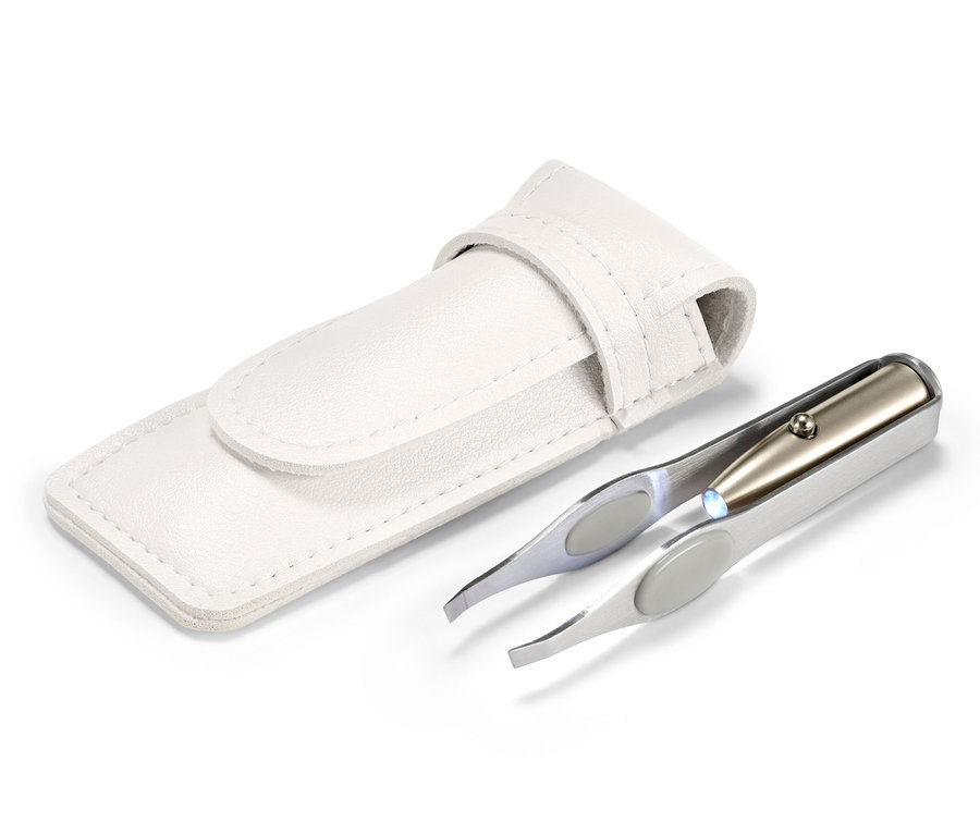 LED Işıklı Cımbız, beyaz bir kılıfın yanında.