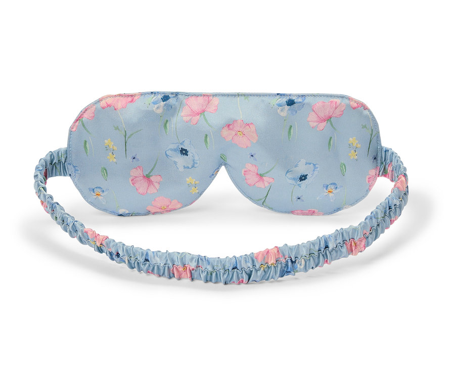 Çiçek desenli açık mavi uyku maskesi.