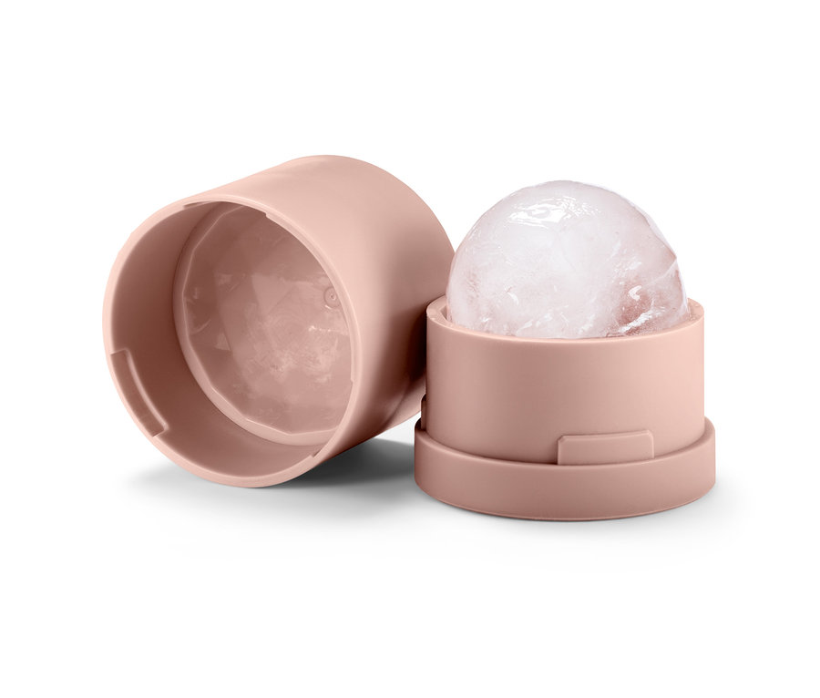 Pembe tutucuda yüz için buz kalıbı, yanında kapak.