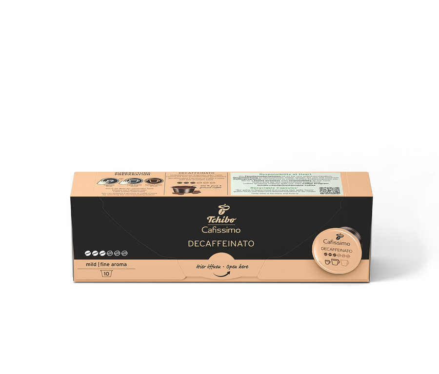 "Hier öffnen Open here" yazısıyla birlikte bir paket Tchibo Cafissimo Decaffeinato kapsülü.