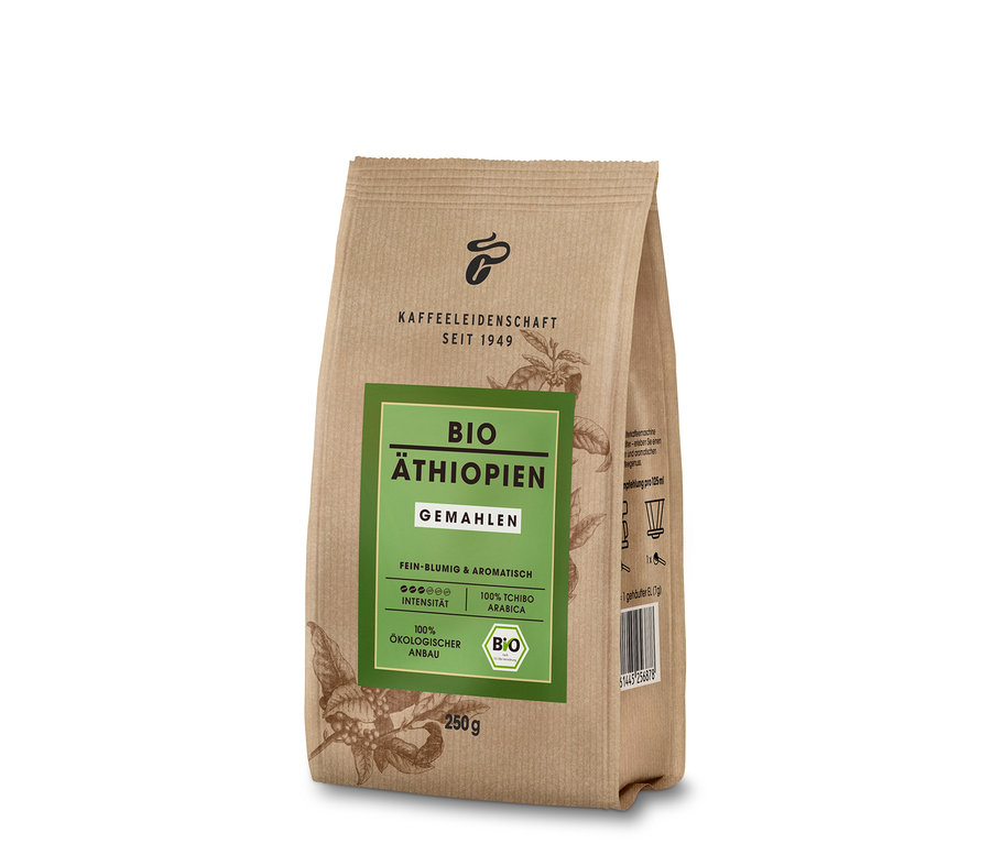 Yeşil etiketli, 250g Tchibo Bio Äthiopien - Gemahlen kahve paketi dikey duruyor.