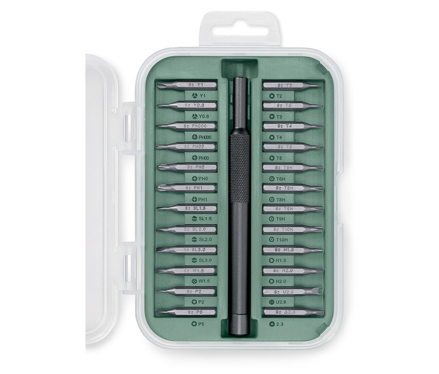 Yeşil bir kutuda bir hassas tornavida seti.