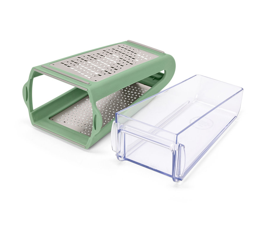 Yeşil renkli, toplama kaplı 2 taraflı rende beyaz bir yüzeyde duruyor.