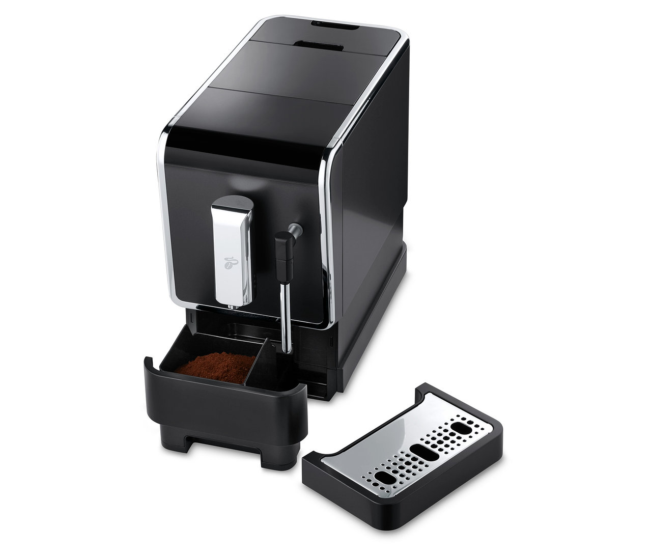 Antrasit rengindeki »Esperto Latte« Tchibo tam otomatik kahve makinesinin, çıkarılmış kahve posası haznesi ve damlama tepsisi ile detay görünümü.