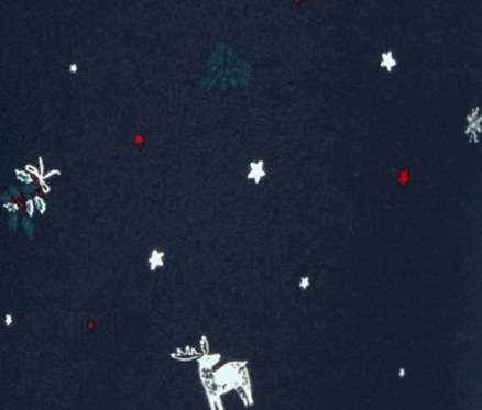 Lacivert yumuşak tayt; yıldız, ay, ağaç, kar tanesi ve geyik desenli.