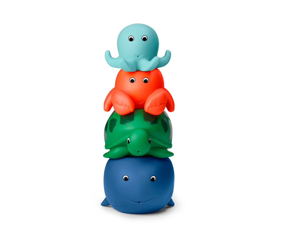 Dört adet su fışkırtan hayvan (ahtapot, yengeç, kaplumbağa, balina) üst üste yığılmış.