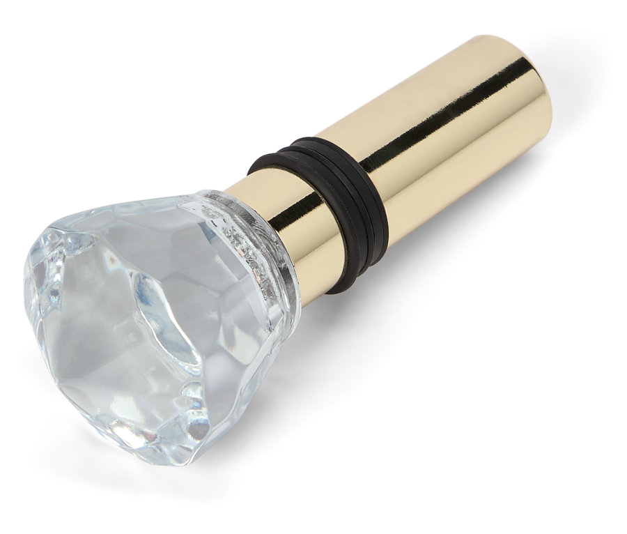 Elmas şeklinde cam süslemeli ve altın metal tabanlı şişe tıpası.