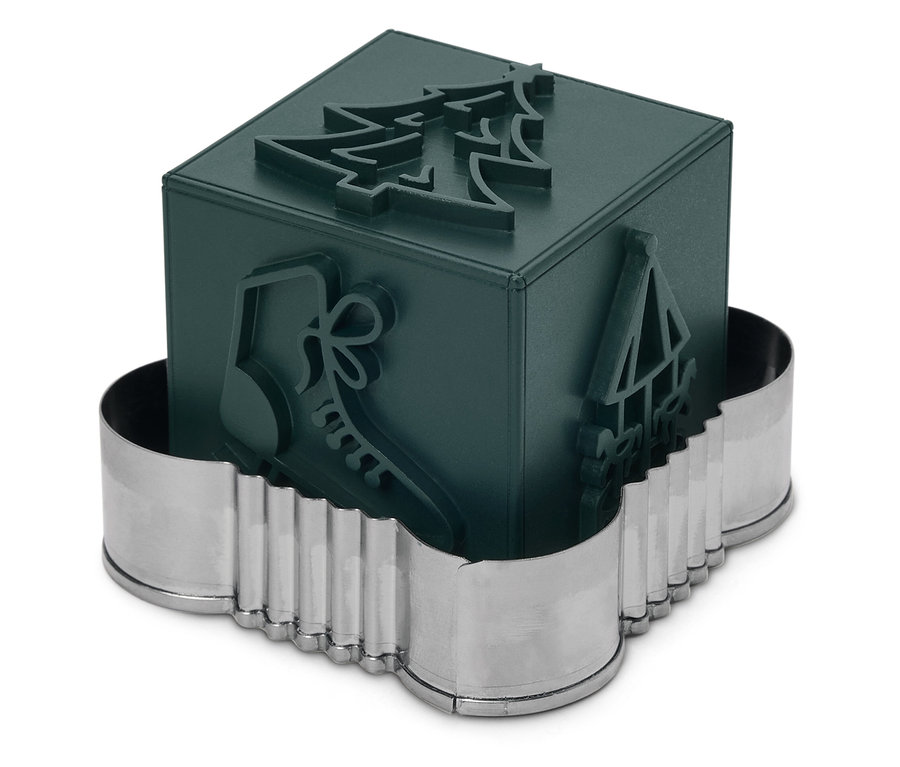 Dekoratif gümüş çerçeve içinde ağaç, paten ve çadır kabartmaları olan yeşil bir küp.