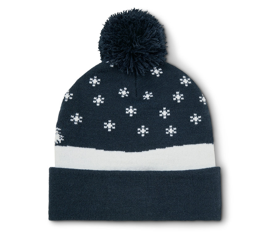 Lacivert örgü bere, beyaz kar taneleri ve ponponlu.
