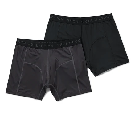 İki adet erkek boxer şortu: biri siyah ve biri koyu gri.