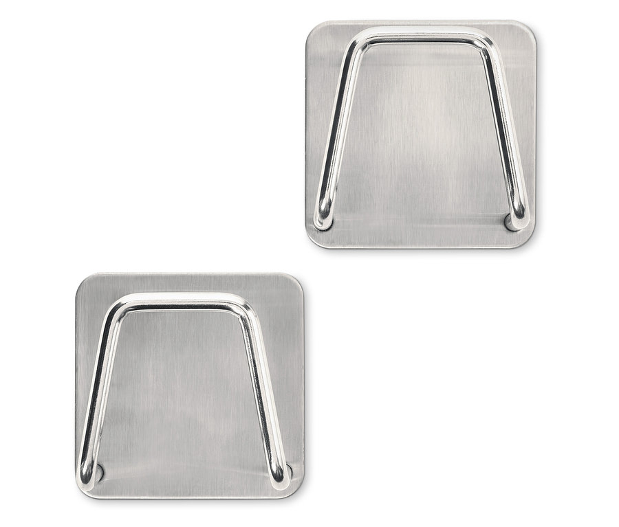 İki adet paslanmaz çelik sünger tutucu.