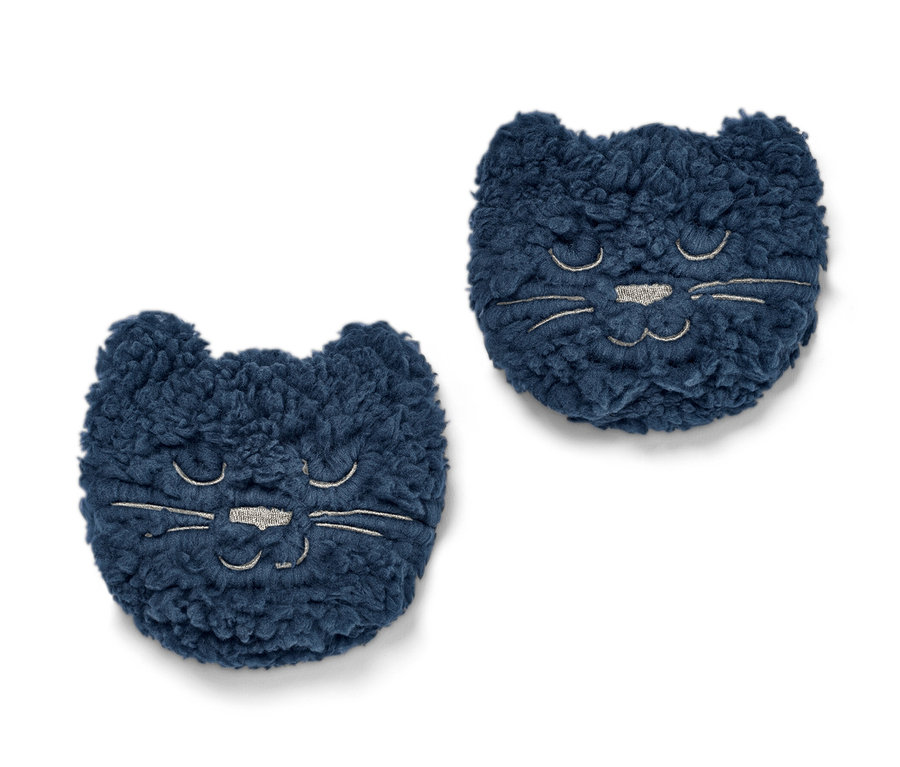 İki adet mavi »Kedi« cep ısıtıcı beyaz bir arka plan üzerinde duruyor.