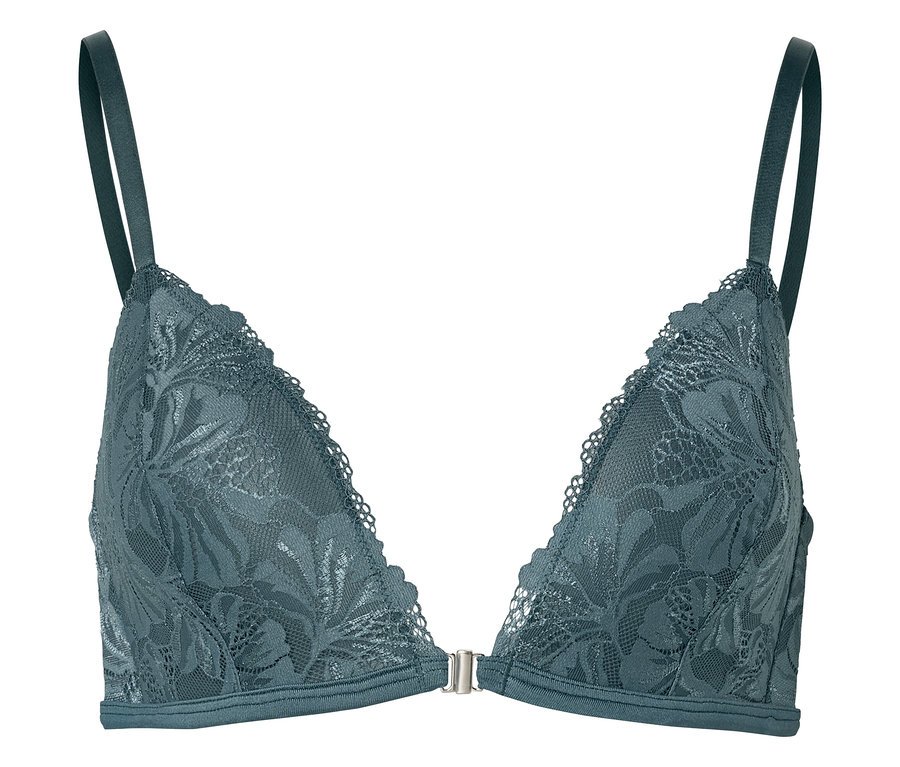 Beyaz bir arka planda duran, balenli ve ayarlanabilir askılı yeşil dantel sütyen.