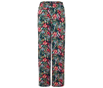 Koyu bir arka plan üzerinde renkli yaprak deseni olan uzun bir pantolon.