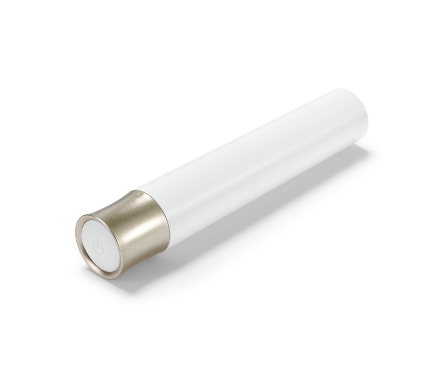 Altın detaylı beyaz elektrikli kaş şekillendirici.