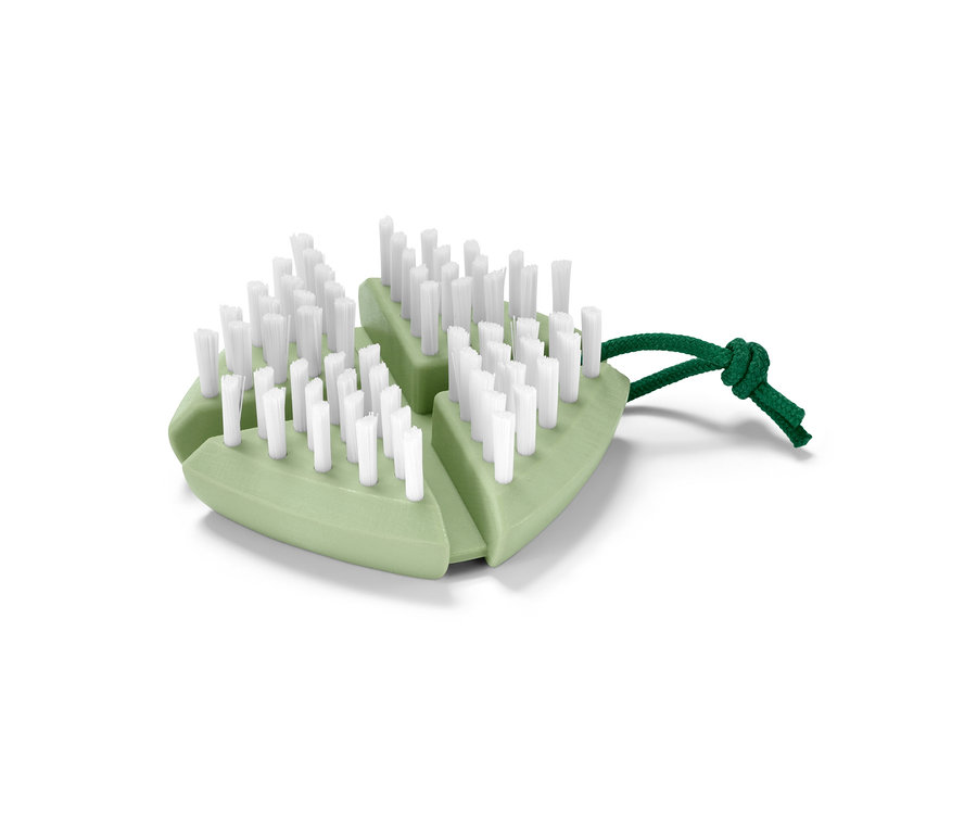 Beyaz kıllı ve yeşil ipli, yeşil esnek sebze ve meyve fırçası.