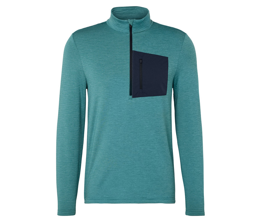 Turkuaz kırçıllı, uzun kollu, kısa fermuarlı ve sol göğsünde lacivert cebi olan üst.