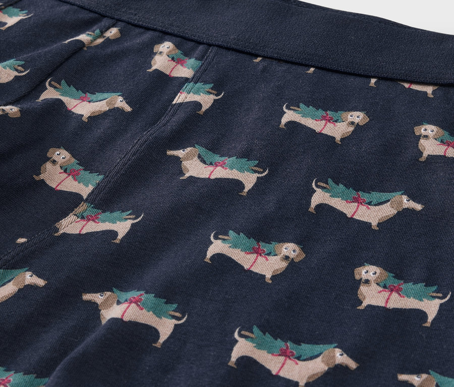 Noel ağacı taşıyan dachshund baskılı lacivert baksır detayı.